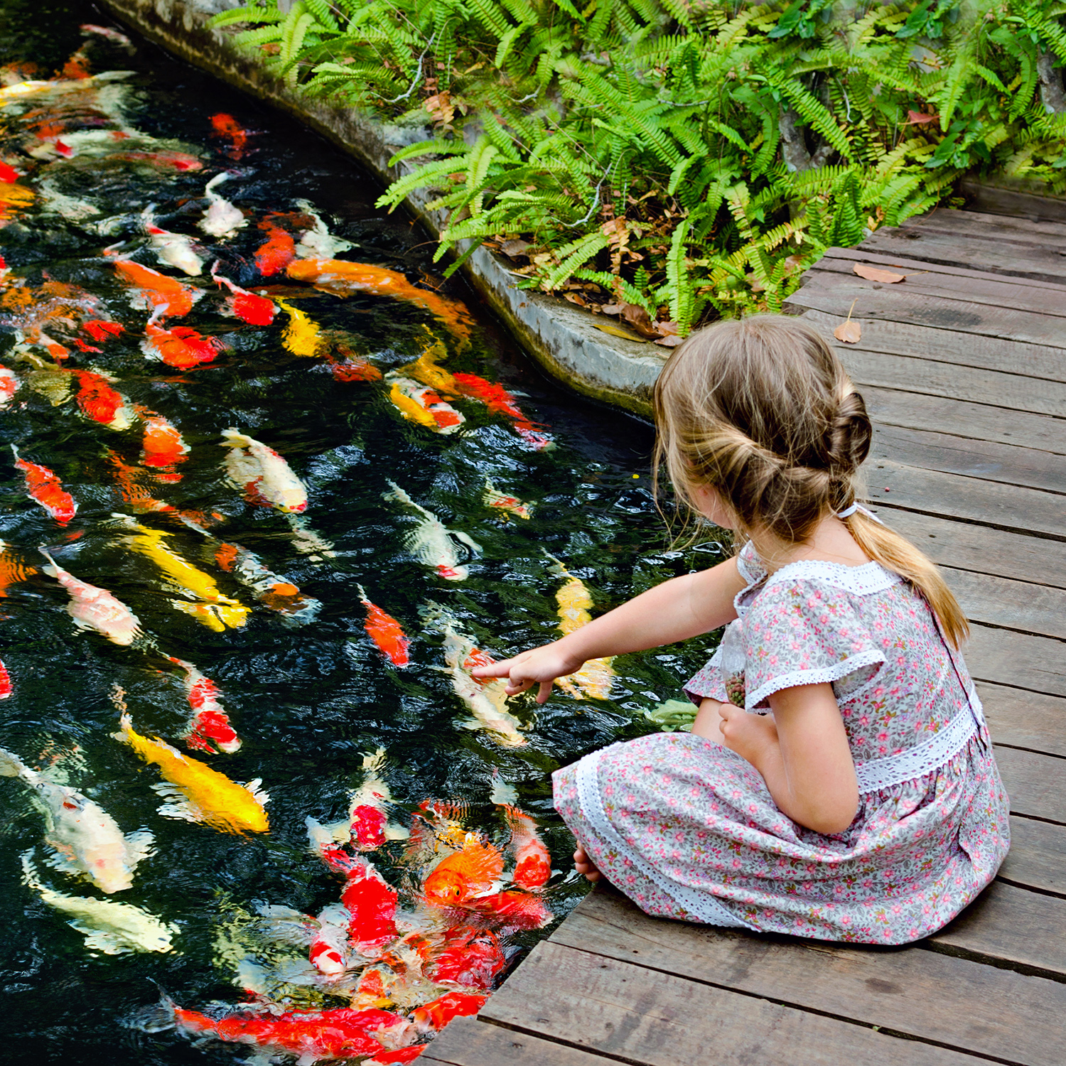 Little girl at pond